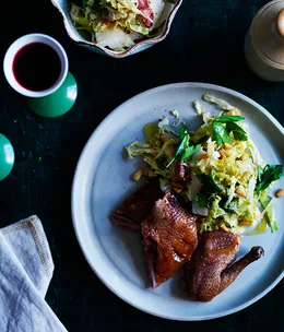 Pigeon with pancetta, cabbage and pine nut salad