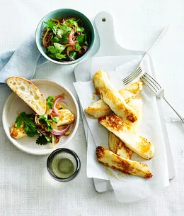 Fried haloumi with lemon, coriander and pine nuts