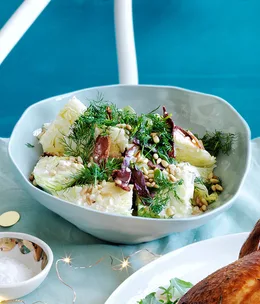 Iceberg lettuce salad with bacon, pine nuts and buttermilk dressing