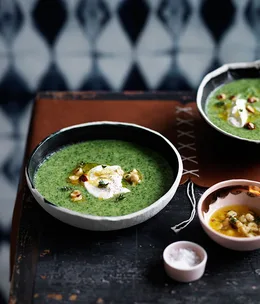 Broccoli soup with crème fraîche and hazelnuts