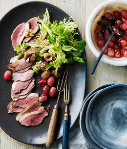 Smoked duck breast with pickled grapes