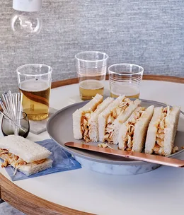 Spicy lobster tea sandwiches with green mango and chilli relish