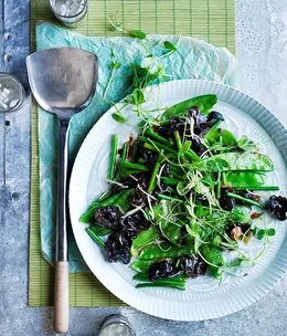 Stir-fried black fungus with ginger, garlic stems and snow peas