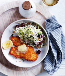 Chicken schnitzels with cabbage and grape salad