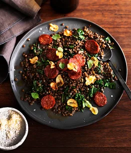 Green lentils with salami and cavolo nero