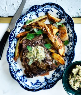 Skirt steak with pepita-lime butter and roasted potatoes