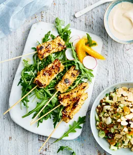 Como Shambhala’s spiced chicken skewers with barley, fruit and nut salad