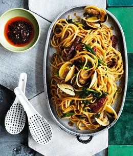 Clam, sausage and black bean noodles with garlic chives
