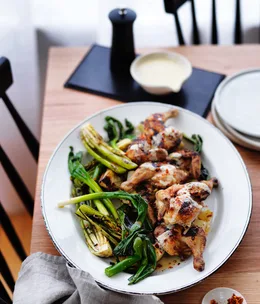 Char-grilled spatchcock, celery heart, fennel and spring onions with lemon sauce