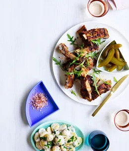 Pastrami-spiced pork ribs with potato salad and pickles