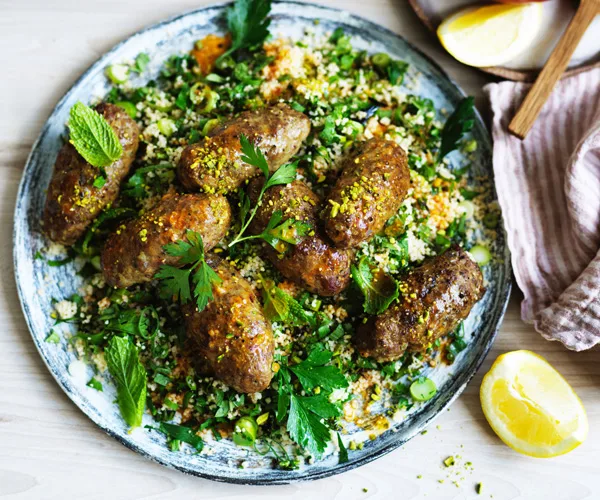 Beef koftas with green couscous and pistachio nuts