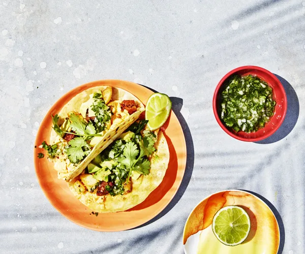 Potato, chorizo and egg tacos with salsa verde