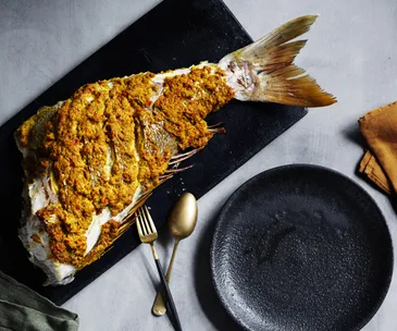 Whole snapper roasted with curry flavours