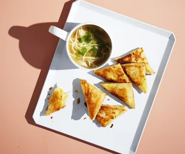 Teeny-tiny cheese toasties with chicken noodle soup