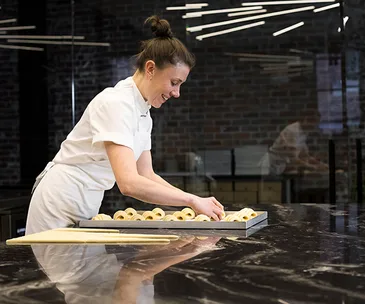 Kate Reid inside the "cube" at the Fitzroy Lune Croissanterie store