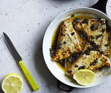 Pan-fried swordfish with lemon-caper butter and salted potatoes