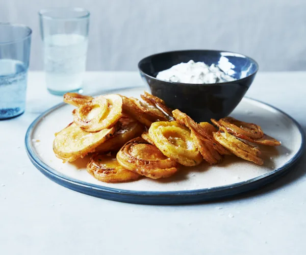 Onion and potato fritters with raita