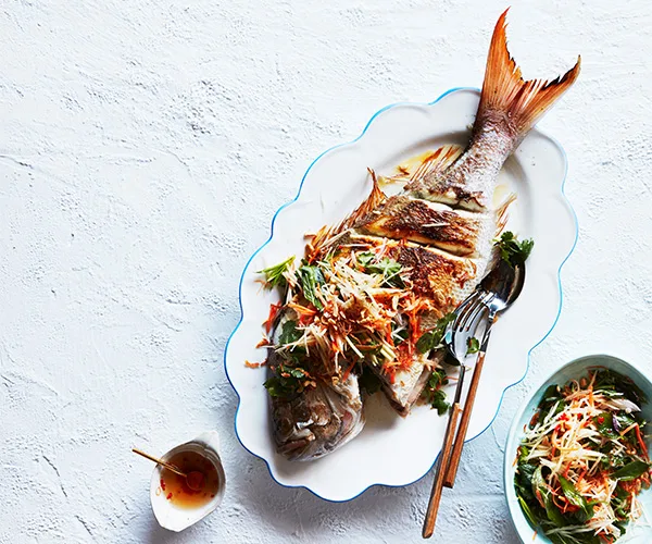 Whole barbecued snapper with green papaya salad