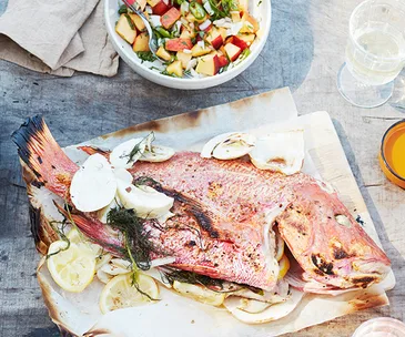 Whole barbecued fish with chilli and peach salsa