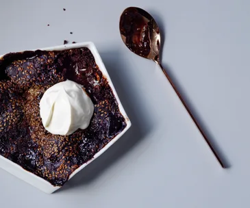 Chocolate self-saucing pudding with miso and sesame crunch