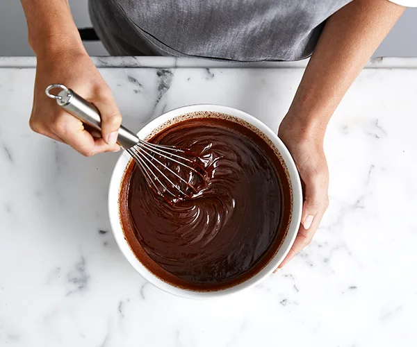 Whisking chocolate ganache