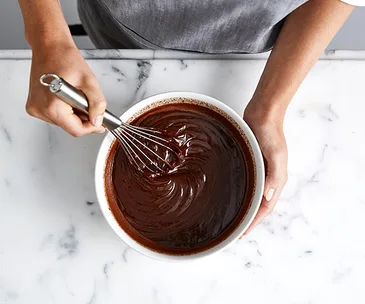 Whisking chocolate ganache