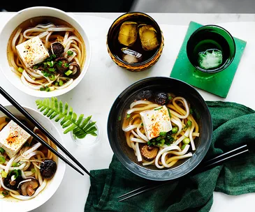 Udon noodle soup with shiitake mushrooms and tofu