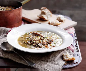 Mushroom and barley broth with smoked bacon
