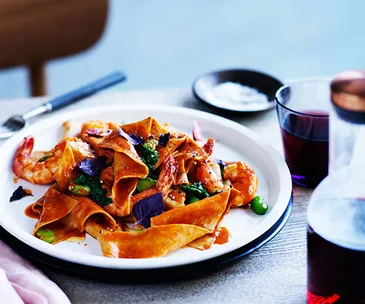 Spelt maltagliati with tiger prawns and shellfish sauce