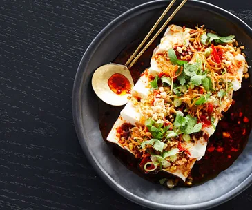 Cold silken tofu with peanuts, salted daikon, coriander and black vinegar 