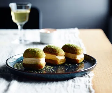 Honey and ginger ice-cream and lemon curd doughnut sandwiches