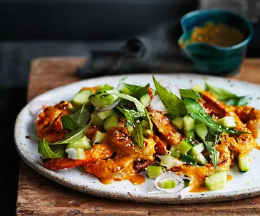 Turmeric and coconut grilled prawns with mint and cucumber salad
