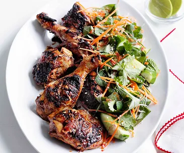 Grilled chicken with cucumber, carrot and Asian herb salad