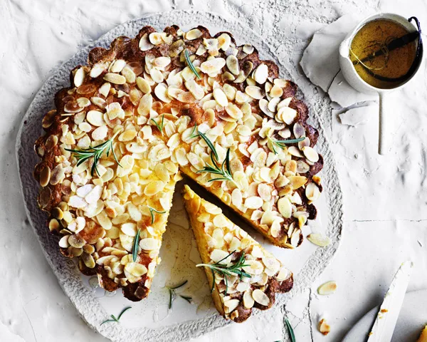 Ricotta-polenta cake with lemon-rosemary syrup