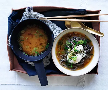 Miso with soba, poached eggs and spring onion