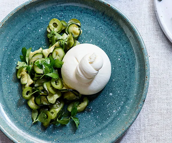 Burrata, preserved zucchini, green olives and lovage by Dave Verheul