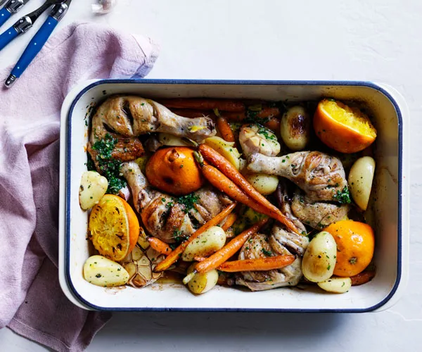 Chicken, carrot and orange tray bake with chive butter