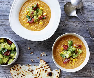 Mexican corn soup with crushed avocado