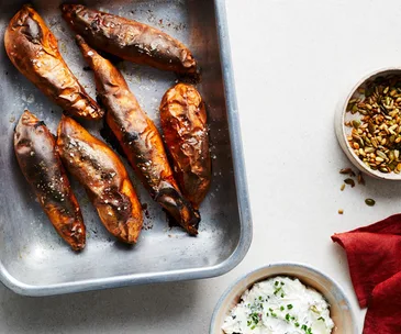Baked sweet potatoes with goat's cheese topping