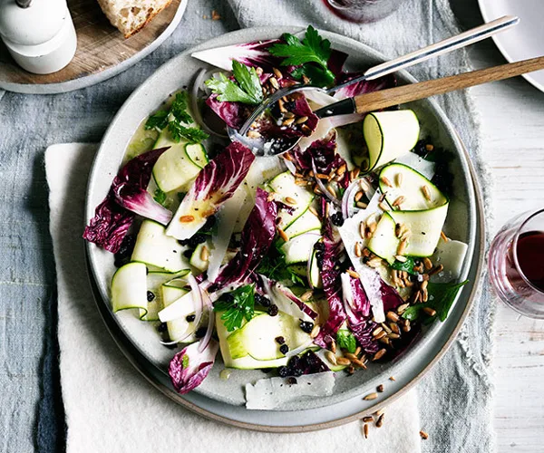 Zucchini salad with pecorino, currants, sunflower seeds and lemon