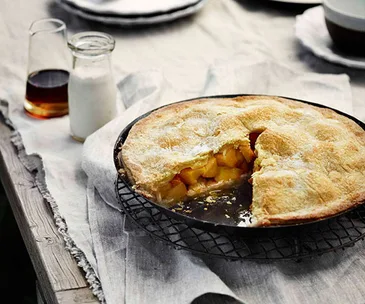 Sugar-crusted peach pie with almond cream