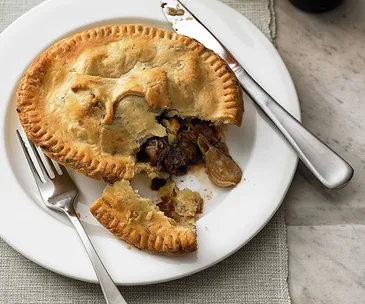 Beef cheek, onion and stout pies with thyme and onion pastry