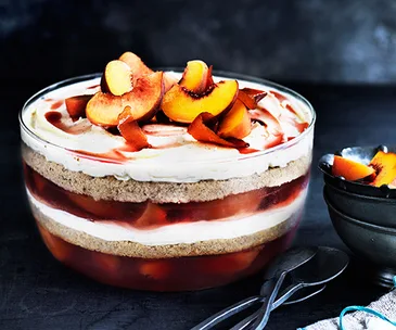 Peach, almond and prosecco trifle