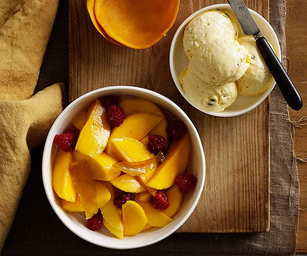 Passionfruit semifreddo with mango and raspberry salad