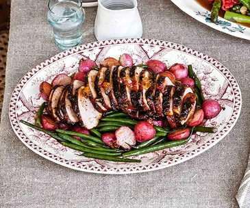 Glazed ham with radishes and beans