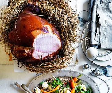Ham baked in hay with roast carrot and barley salad