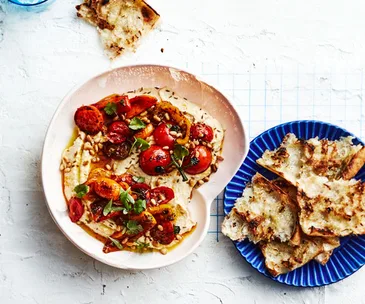 Hummus with blistered tomatoes