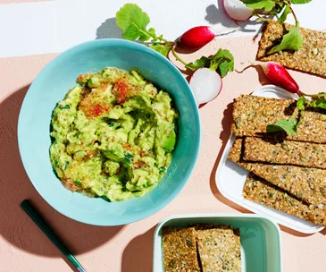 Buckwheat-hemp crackers with avocado and finger lime