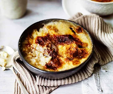 White chocolate and banana baked rice puddings