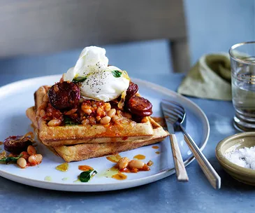 Wholemeal waffles with baked beans, chorizo and egg